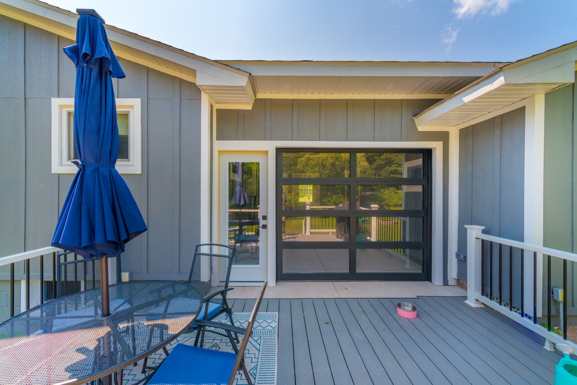 Deck and transition space between the breezeway interior and outdoor living area in Marquette, MI